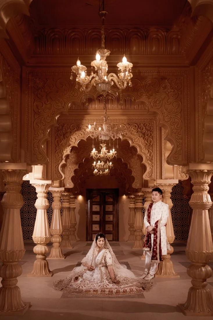 A couple framed by temple architecture